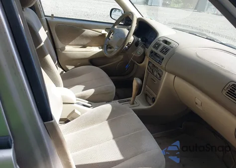 1999 Toyota Corolla Ce from USA, damaged, VIN 2T1BR12E1XC141396